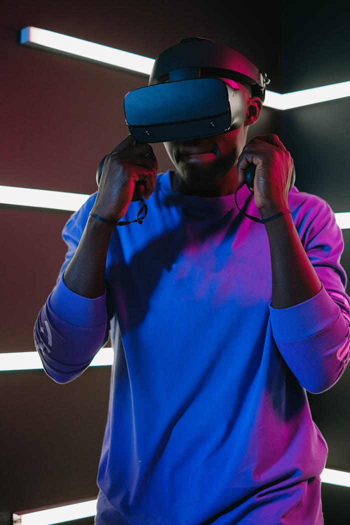 Adult man wearing a VR headset in a modern, colorful setting, exploring virtual reality.