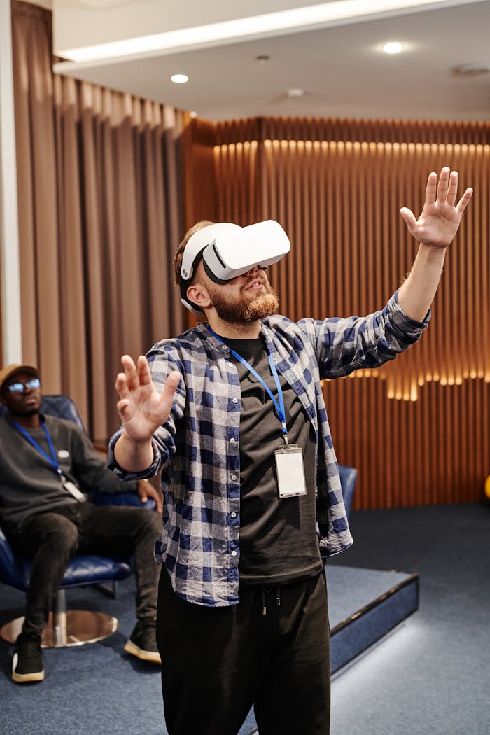 Adult man using VR headset in modern indoor setting, exploring virtual reality technology.